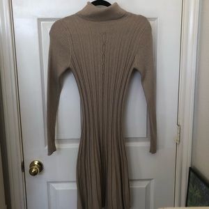 Tan form fitting turtleneck dress